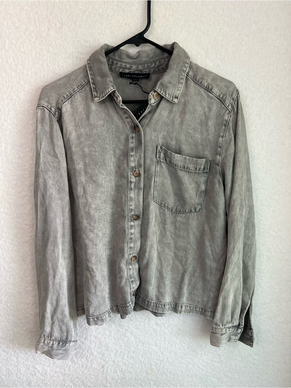 Jane and Delancey gray acid-wash button-down shirt featuring a relaxed silhouett